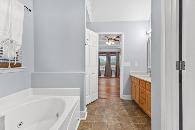 203 Abbigael Dr, Portland, TN 37148 - full bath with a ceiling fan, a tub with jets, vanity, and baseboards
