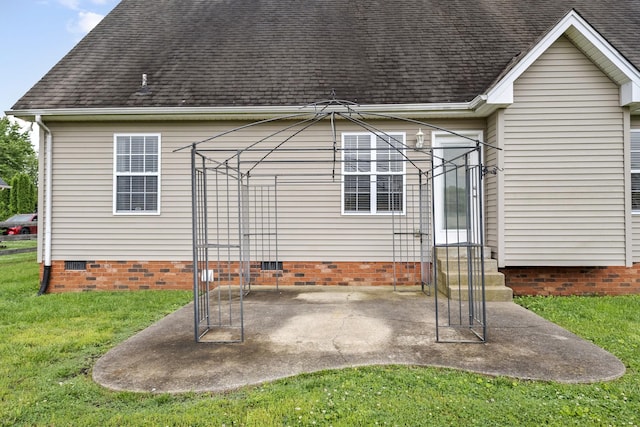 203 Abbigael Dr, Portland, TN 37148 - back of house with entry steps, crawl space, a lawn, roof with shingles, and a patio