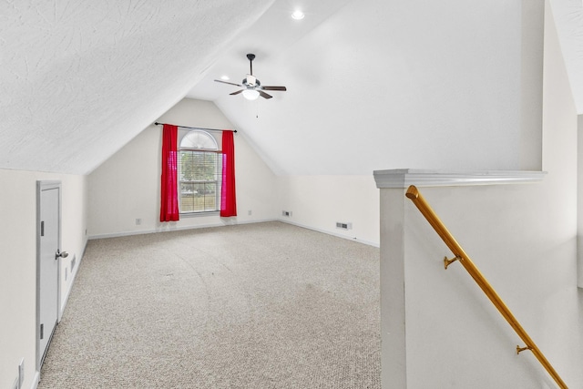 203 Abbigael Dr, Portland, TN 37148 - additional living space with carpet floors, a ceiling fan, lofted ceiling, and baseboards