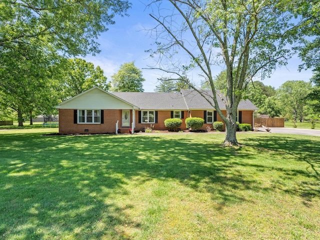 single story home with concrete driveway and brick siding