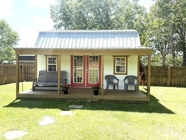 back of property featuring metal roof and a standing seam roof