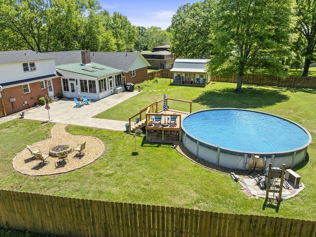 500 Twelve Oaks Rd, Tullahoma, TN 37388 - view of pool featuring a sunroom, a patio, an outbuilding, and a deck
