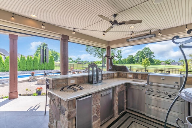1041 Albatross Way, Gallatin, TN 37066 - view of patio featuring a fenced backyard, area for grilling, exterior kitchen, and an outdoor pool