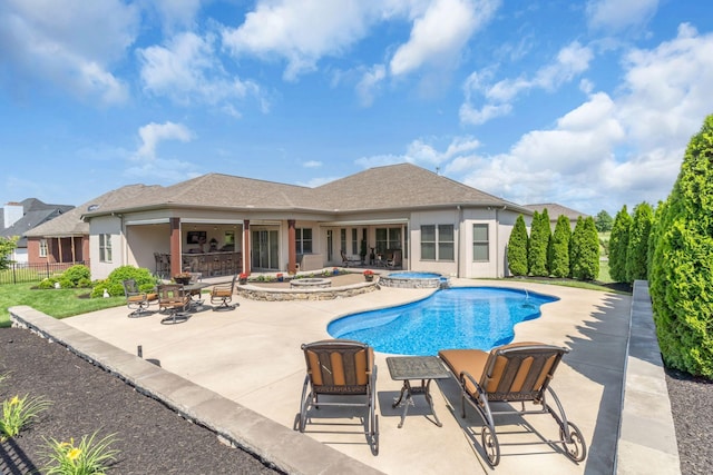 1041 Albatross Way, Gallatin, TN 37066 - view of swimming pool featuring a patio area, a pool with connected hot tub, and fence