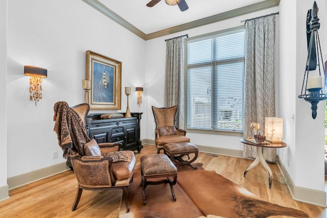 1041 Albatross Way, Gallatin, TN 37066 - sitting room with crown molding, wood finished floors, baseboards, and ceiling fan