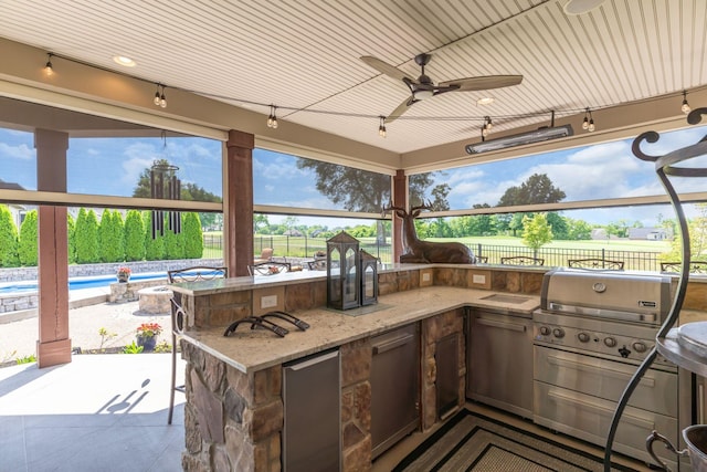 1041 Albatross Way, Gallatin, TN 37066 - view of patio with grilling area, fence, exterior kitchen, and ceiling fan