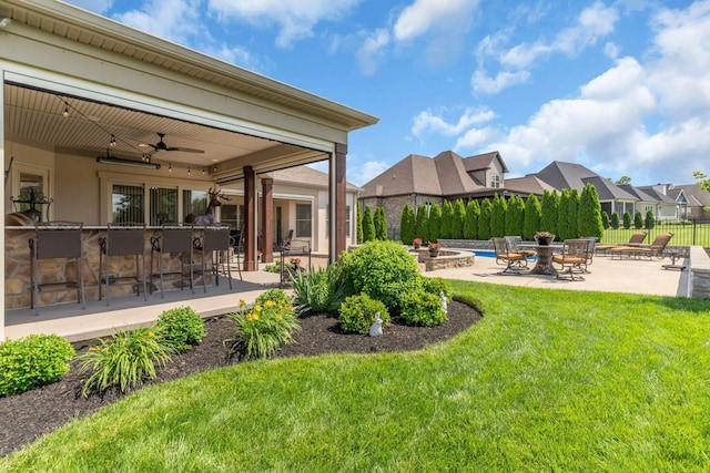 1041 Albatross Way, Gallatin, TN 37066 - view of yard featuring an outdoor fire pit, a patio, and a ceiling fan