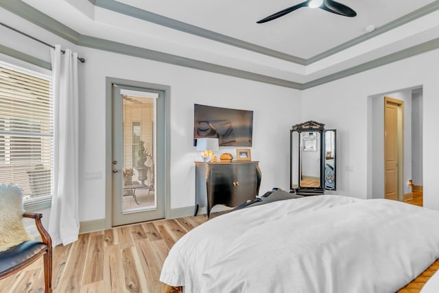 1041 Albatross Way, Gallatin, TN 37066 - bedroom with access to outside, a tray ceiling, crown molding, light wood-style floors, and ceiling fan