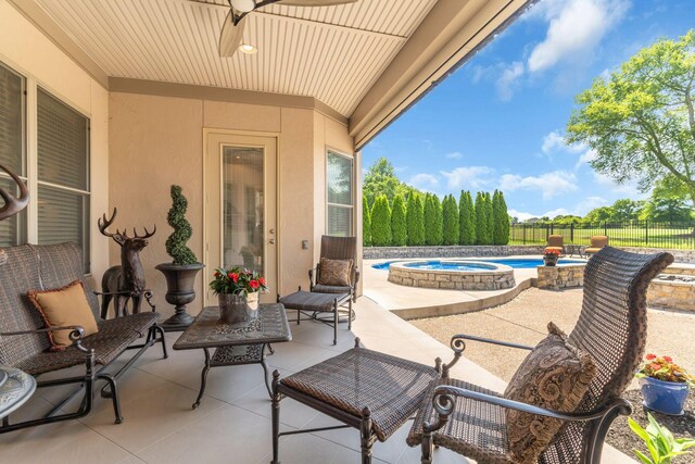1041 Albatross Way, Gallatin, TN 37066 - view of patio / terrace with an in-ground hot tub and fence