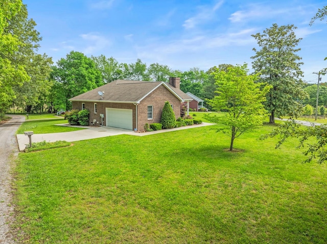 30 Sullivan Ln, Tullahoma, TN 37388 - view of front of house with a chimney, brick siding, a garage, a front lawn, and driveway