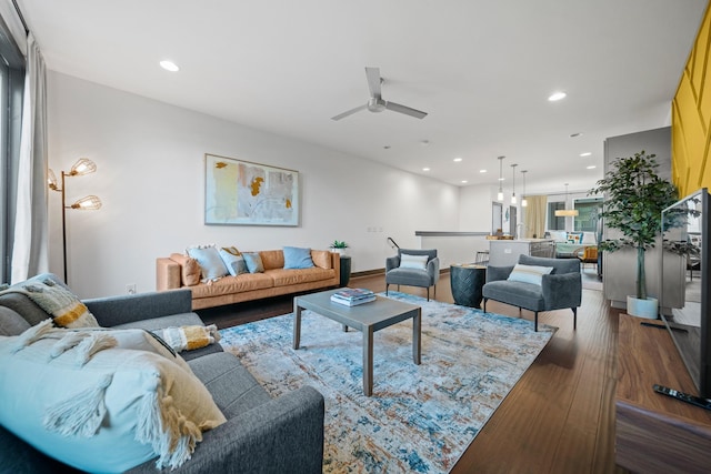 living room with wood finished floors, recessed lighting, and ceiling fan