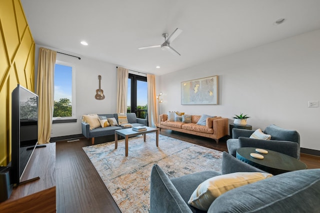 living room featuring a ceiling fan, dark wood-style flooring, recessed lighting, and baseboards