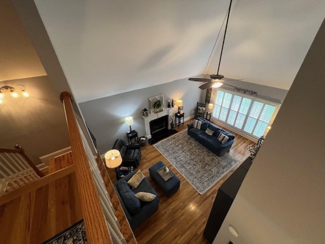 3411 Meadowcrest Dr, Murfreesboro, TN 37129 - living area featuring wood finished floors, a ceiling fan, a fireplace, and lofted ceiling