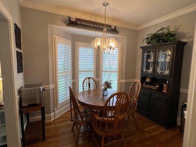3411 Meadowcrest Dr, Murfreesboro, TN 37129 - dining room with dark wood-style floors, a chandelier, ornamental molding, and baseboards