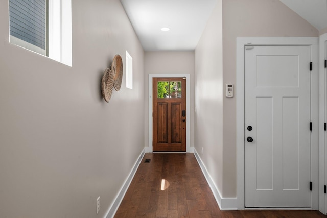 entryway featuring dark wood-style flooring and baseboards