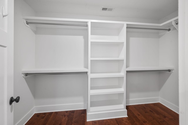 spacious closet featuring wood finished floors