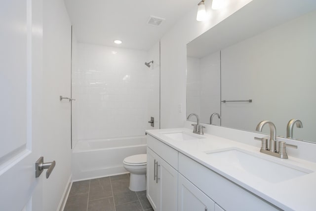 full bath with tile patterned floors, toilet, double vanity, tub / shower combination, and baseboards