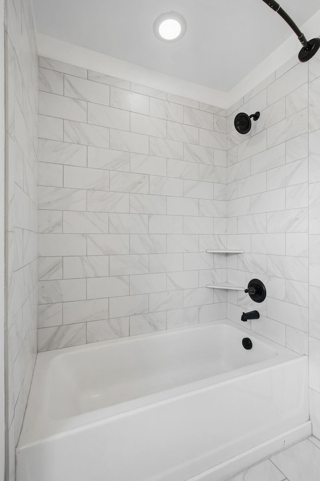full bath featuring bathtub / shower combination