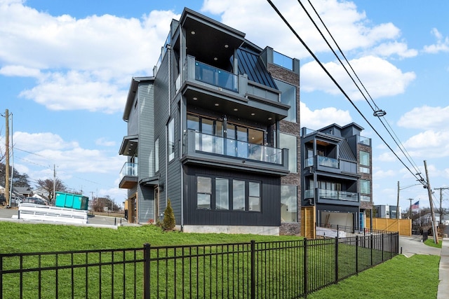 rear view of house with a balcony