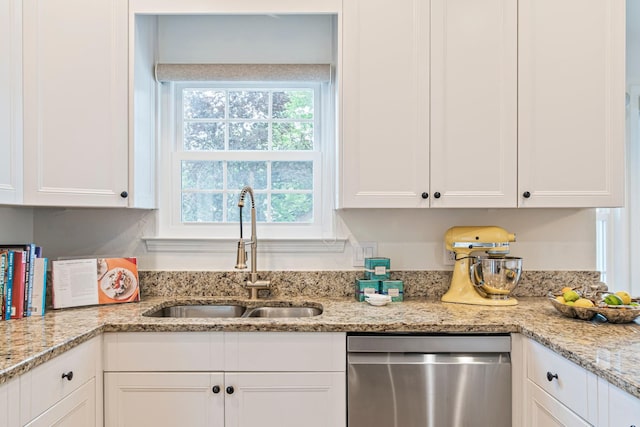 3060 Liberty Hills Dr, Franklin, TN 37067 - kitchen featuring stainless steel dishwasher, a sink, white cabinets, and light stone countertops