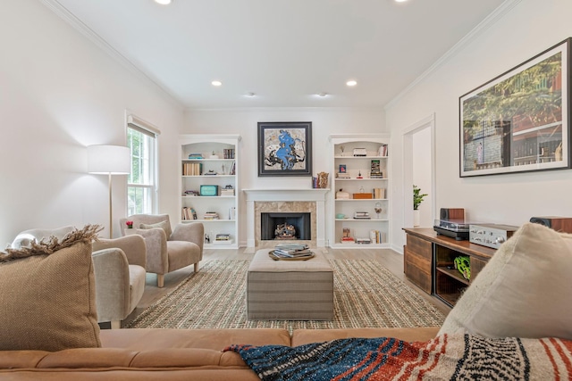 3060 Liberty Hills Dr, Franklin, TN 37067 - living room with ornamental molding, built in shelves, recessed lighting, a fireplace, and wood finished floors