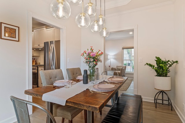 3060 Liberty Hills Dr, Franklin, TN 37067 - dining space with wood finished floors, baseboards, and ornamental molding