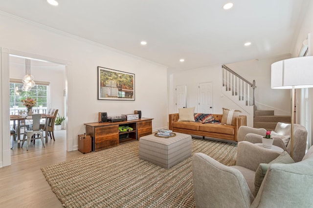 3060 Liberty Hills Dr, Franklin, TN 37067 - living area with stairway, light wood-style flooring, recessed lighting, crown molding, and baseboards