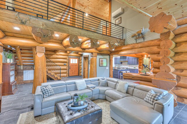 1271 Bivins Rd, Lewisburg, TN 37091 - living area with rustic walls, recessed lighting, stairway, a towering ceiling, and wood ceiling