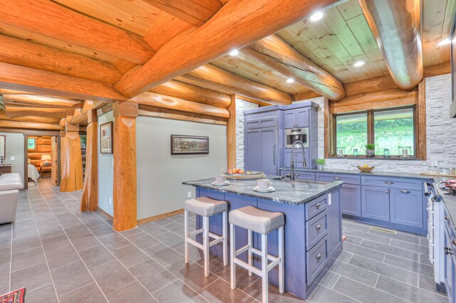 1271 Bivins Rd, Lewisburg, TN 37091 - kitchen with a sink, wood ceiling, recessed lighting, tile patterned flooring, and beamed ceiling