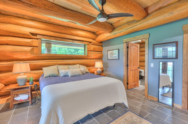 1271 Bivins Rd, Lewisburg, TN 37091 - bedroom featuring baseboards, beam ceiling, and dark tile patterned flooring