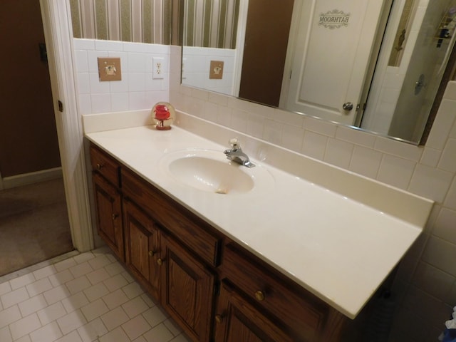 1129 Adam Dr, Cottontown, TN 37048 - bathroom with vanity, wallpapered walls, tile walls, and tile patterned flooring