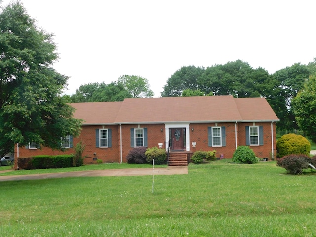 1129 Adam Dr, Cottontown, TN 37048 - single story home featuring brick siding and a front lawn