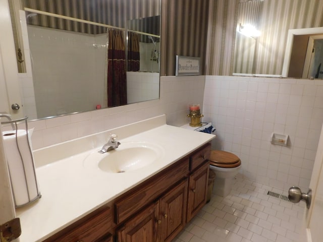 1129 Adam Dr, Cottontown, TN 37048 - bathroom with wallpapered walls, toilet, vanity, curtained shower, and tile patterned flooring