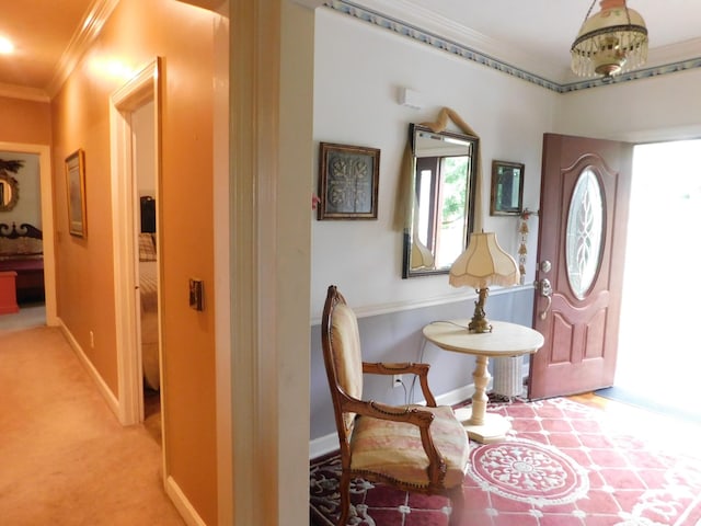 1129 Adam Dr, Cottontown, TN 37048 - foyer featuring crown molding, light colored carpet, and baseboards