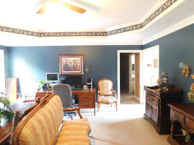 1129 Adam Dr, Cottontown, TN 37048 - office area with crown molding, a ceiling fan, light carpet, and a tray ceiling