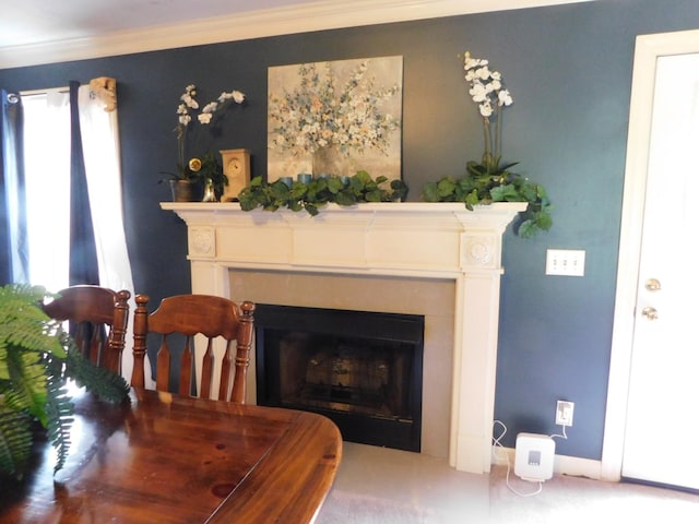 1129 Adam Dr, Cottontown, TN 37048 - dining space with a fireplace and crown molding