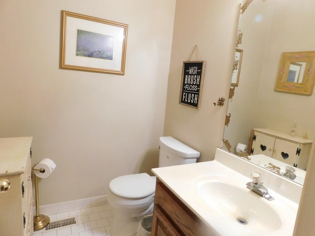 1129 Adam Dr, Cottontown, TN 37048 - bathroom with toilet, tile patterned floors, vanity, and baseboards