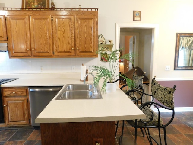 1129 Adam Dr, Cottontown, TN 37048 - kitchen with dishwasher, a sink, stone tile flooring, light countertops, and brown cabinetry