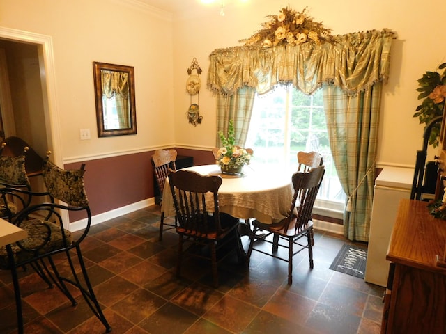 1129 Adam Dr, Cottontown, TN 37048 - dining room with baseboards and crown molding