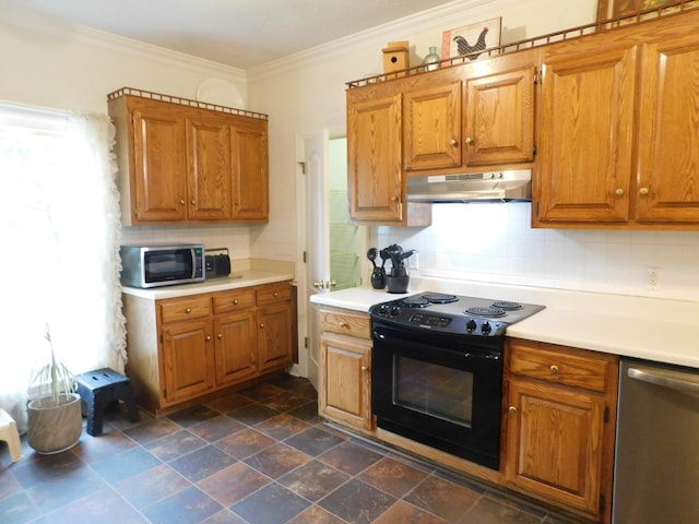 1129 Adam Dr, Cottontown, TN 37048 - kitchen with appliances with stainless steel finishes, under cabinet range hood, decorative backsplash, light countertops, and crown molding