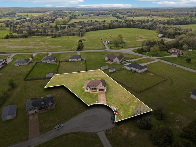 aerial view of property and surrounding area featuring property boundaries highlighted