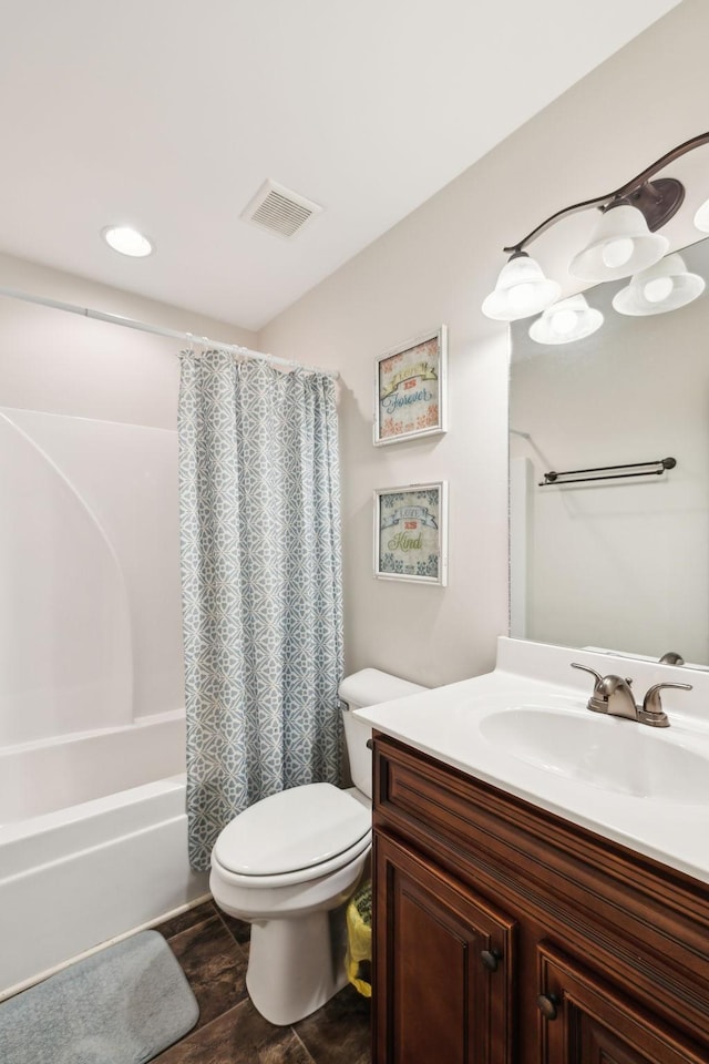 bathroom with toilet, shower / bath combo, vanity, and wood finished floors