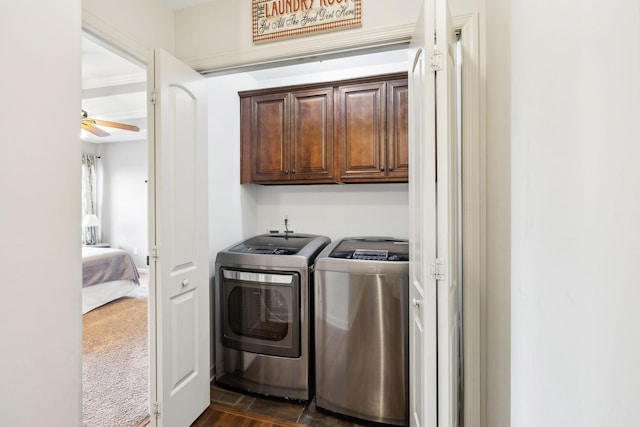 laundry area featuring cabinet space, washing machine and dryer, and a ceiling fan