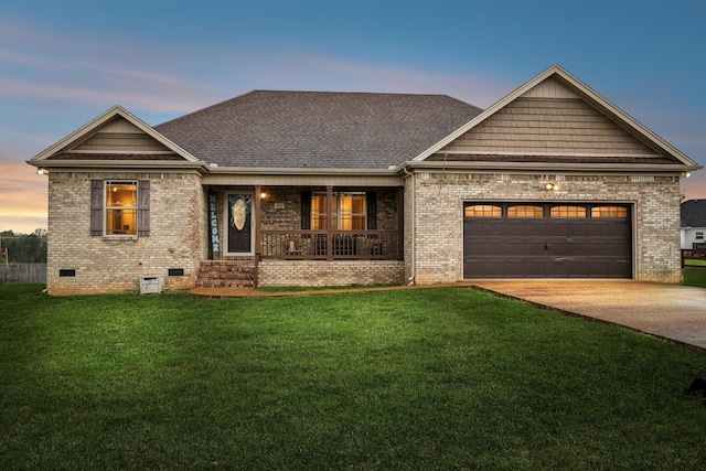view of front facade featuring covered porch, a front lawn, crawl space, brick siding, and driveway