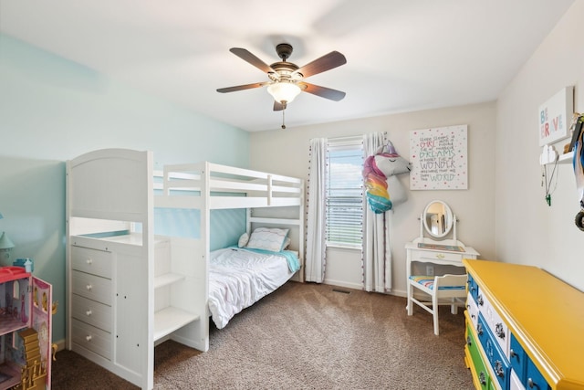 carpeted bedroom with a ceiling fan