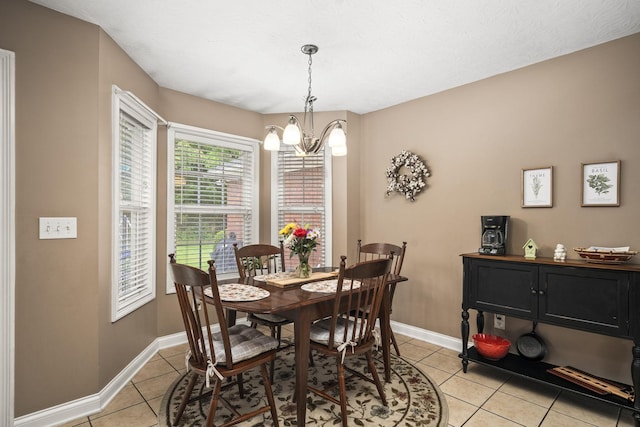 103 Nashay Ct, Portland, TN 37148 - dining area with light tile patterned floors, a chandelier, and baseboards