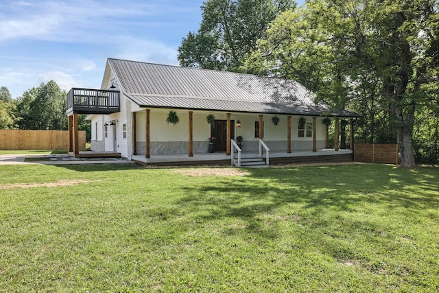 view of front of home featuring a porch and metal roof