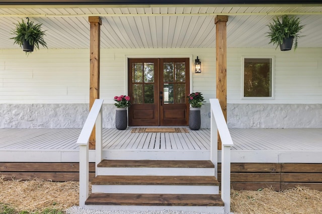 property entrance with french doors and covered porch