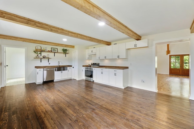 kitchen with stainless steel appliances, dark wood-style flooring, open shelves, white cabinets, and beamed ceiling