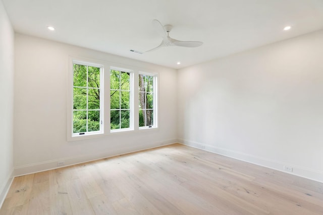 unfurnished room with light wood-style floors, baseboards, ceiling fan, and recessed lighting